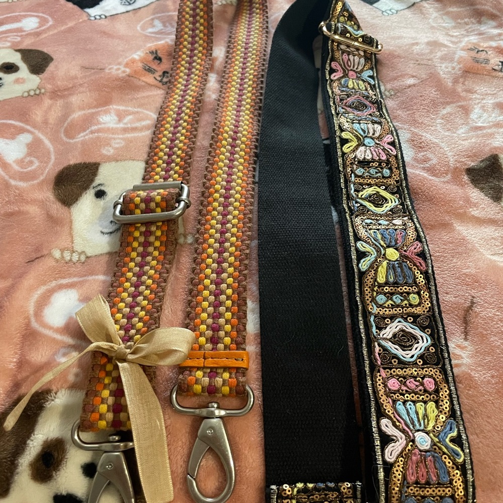 Beautiful Crossbody Straps , from fossil and the shiny strap is unbranded . GUC